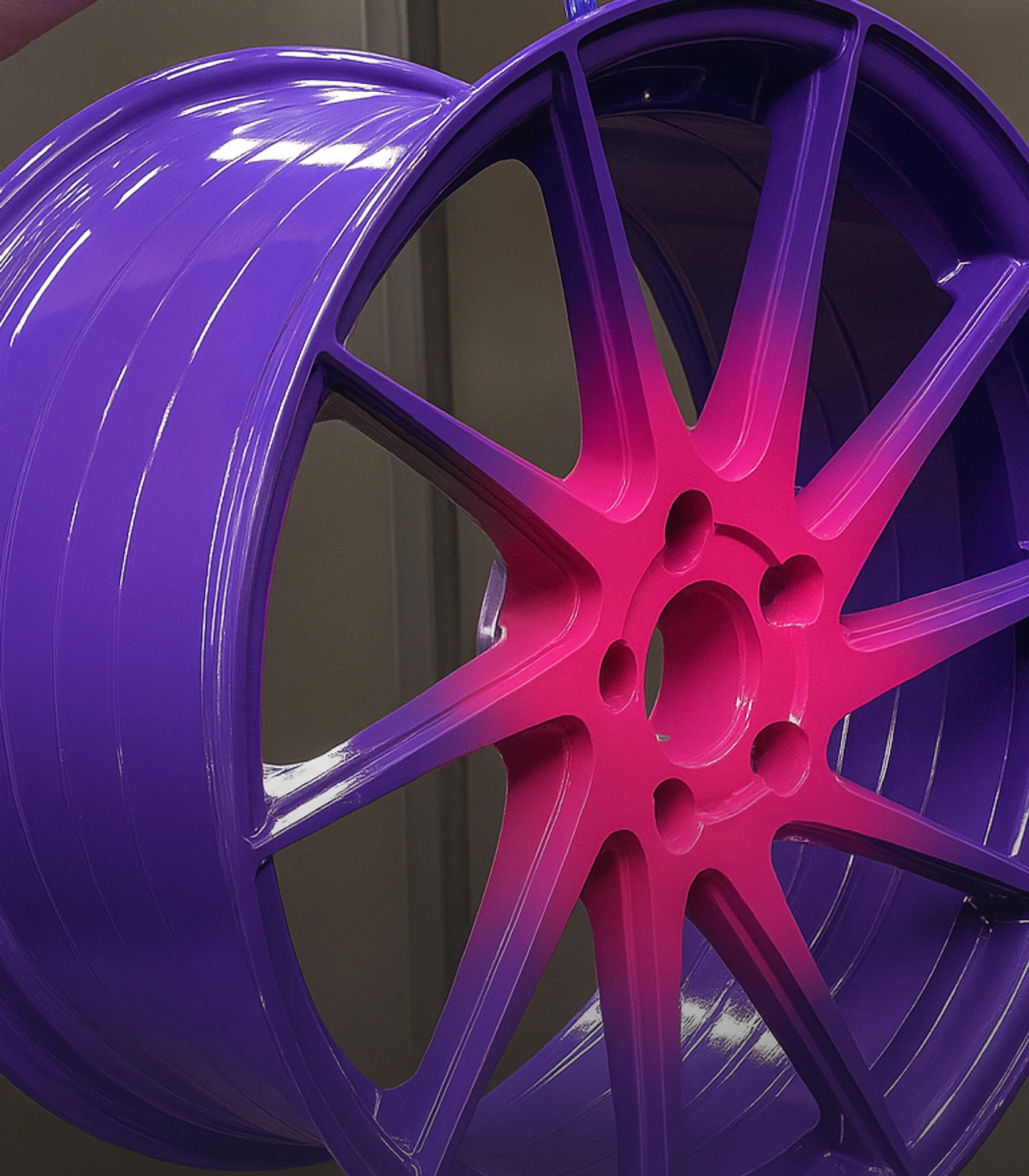 Custom metallic purple powder-coated automotive wheel with a deep gloss finish